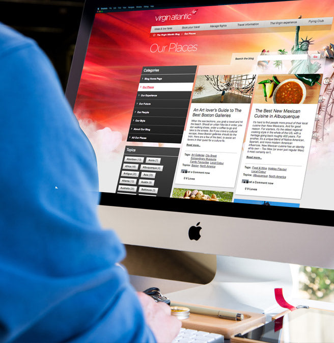 An individual browsing the Virgin Atlantic blog page on an Apple Mac